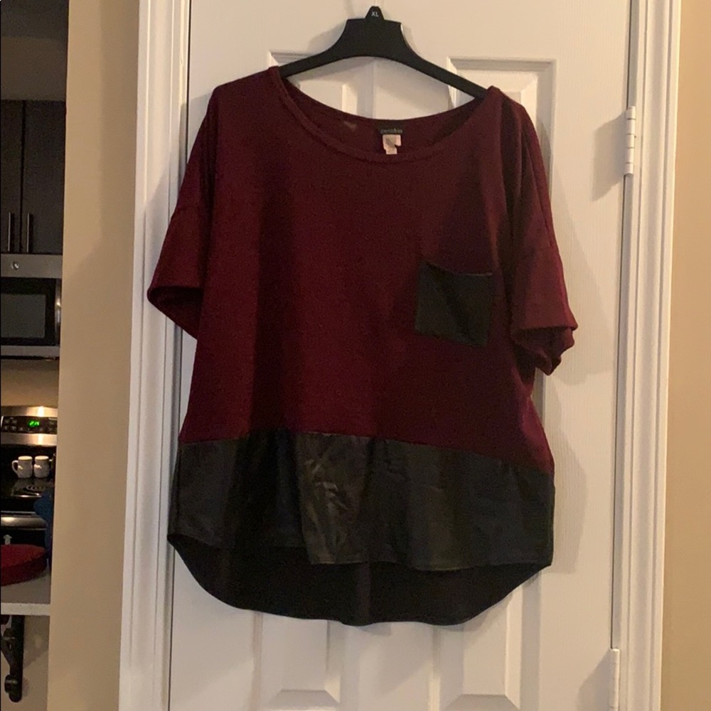 Maroon sweater w/ black leather pocket and bottom